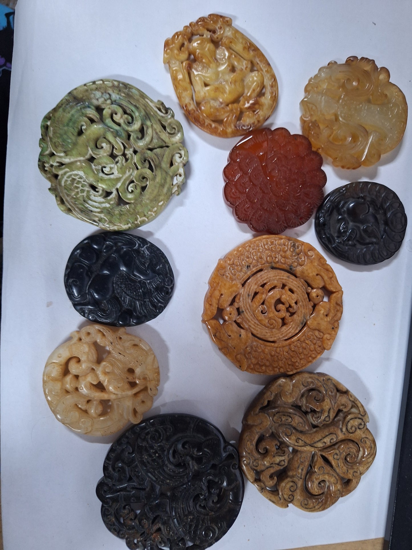 Carved stone disks