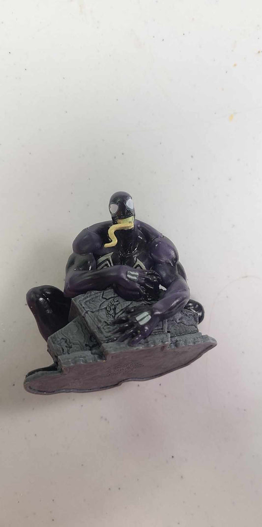 Venom, Squatting Disney figure