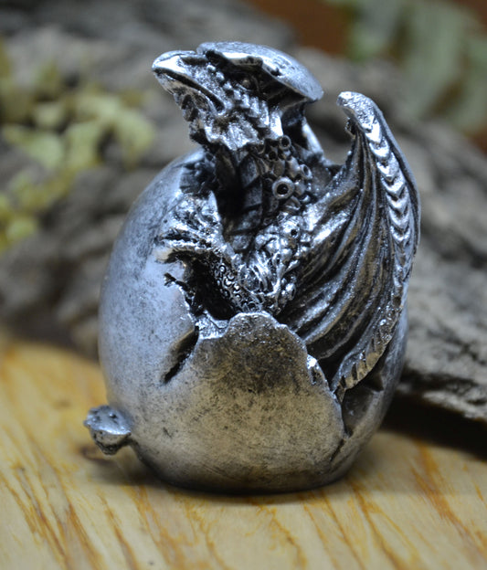 Dragon, hatching with shell helmet